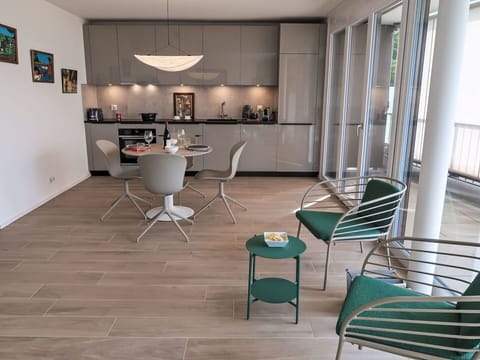 Furniture, Flooring, Interior Design, Floor, Chair, Wood, Wood Flooring, Table, Lighting, Kitchen & Dining Room Table