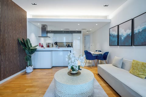 Deluxe Apartment, Balcony, Courtyard View | Living area | 55-inch Smart TV with digital channels