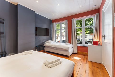 Comfort Triple Room, City View | Free cribs/infant beds, free WiFi, bed sheets