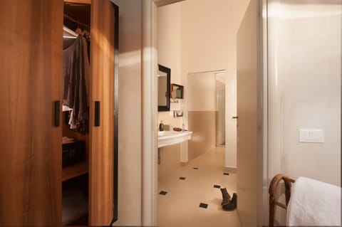 Suite, River View | Bathroom amenities | Free toiletries, hair dryer, bathrobes, slippers