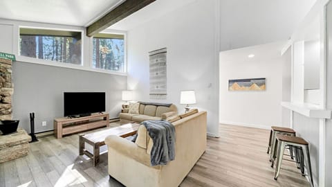 Styled with natural woods and elements throughout