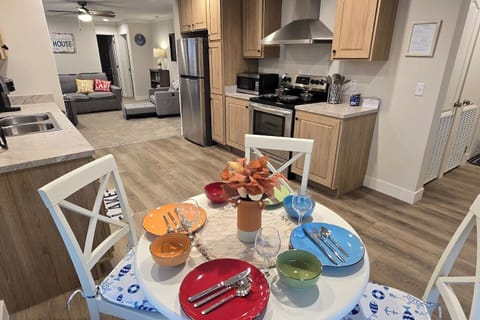 Cook together in a fully equipped kitchen with all-new appliances, Keurig, and dining space for family meals