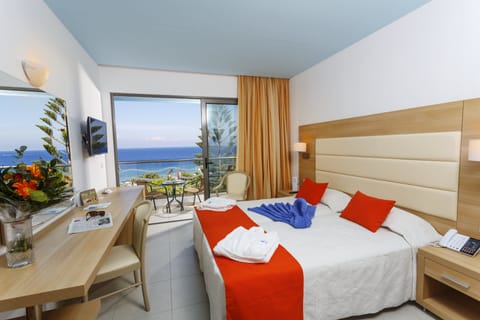 Superior Twin Room, Sea View | In-room safe, desk, laptop workspace, blackout drapes