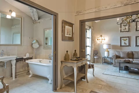 Suite | Bathroom | Designer toiletries, hair dryer, bathrobes, slippers