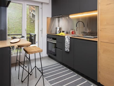 Kitchen, Kitchen Appliance, Countertop, Furniture, Interior Design, Major Appliance, Wood, Flooring, Cabinetry, Home Appliance