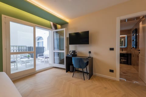 Double Room, Patio, Courtyard View | Desk, blackout drapes, soundproofing, iron/ironing board