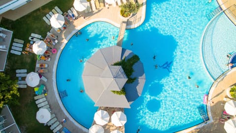 Indoor pool, outdoor pool, pool umbrellas, sun loungers