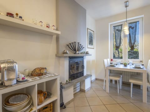 Furniture, Interior Design, Wood, Ceiling, Room, Flooring, Lighting, Floor, Table, Chair