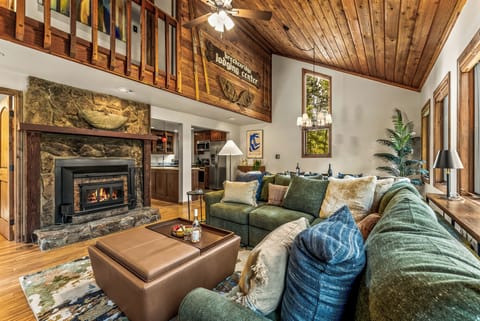 cozy family room with wood burning fireplace