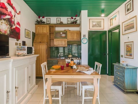 Furniture, Interior Design, Flooring, Wood, Kitchen, Ceiling, Floor, Room, Cabinetry, Lighting