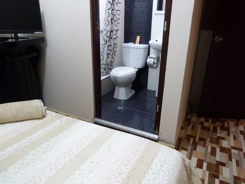 Double Room | Bathroom | Shower, free toiletries, towels