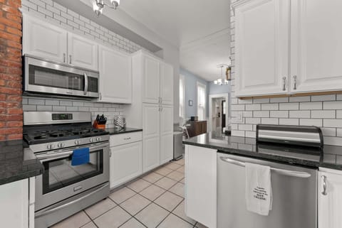 The updated kitchen offers ample space & all the comforts of home