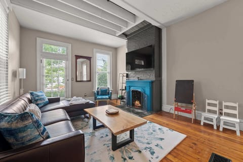 Curl up in the stylish living room & stream your favorites on the smart TV