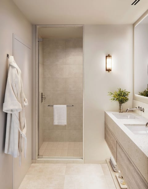 Shower, hair dryer, slippers, towels