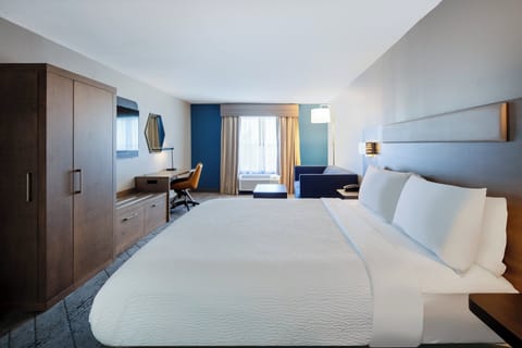 Suite, 1 King Bed | In-room safe, desk, iron/ironing board, cribs/infant beds