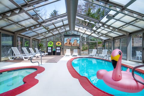 Indoor pool, seasonal outdoor pool, open 9 AM to 9 PM, sun loungers