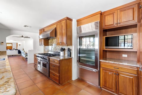Chef's kitchen with modern stainless steel appliances