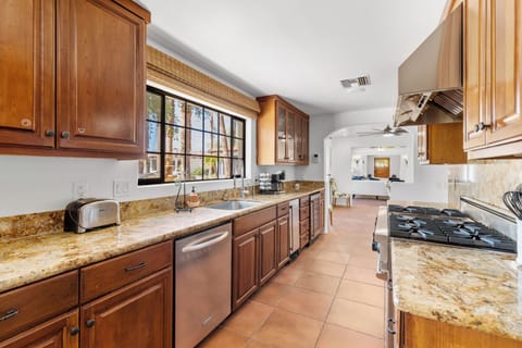 Chef's kitchen with modern stainless steel appliances