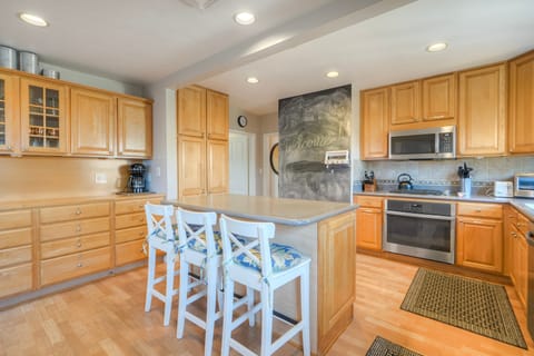 Spacious kitchen island with seating for three.