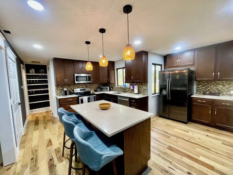 Enjoy the beautiful and spacious kitchen you'll find stocked with everything!