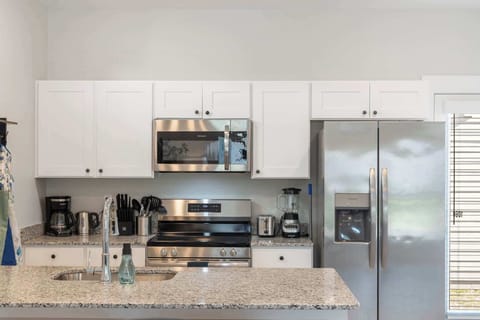 Kitchen is fully appointed and ready to cook. 