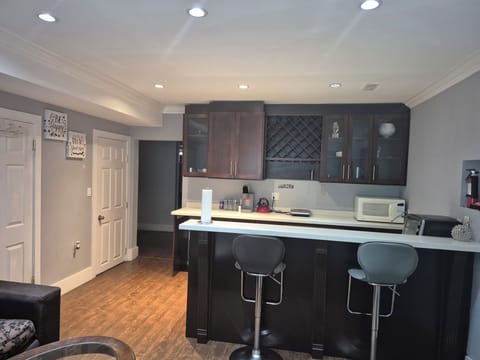 Living Room with Air Flyer, Microwave, Toaster, Oven & Coffee maker