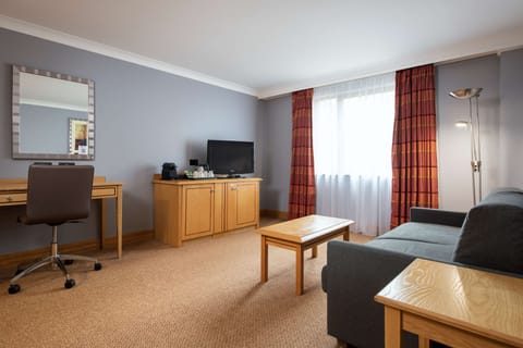 Junior Suite, 1 King Bed | In-room safe, soundproofing, iron/ironing board, free cribs/infant beds