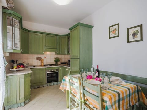 Furniture, Interior Design, Wood, Flooring, Cabinetry, Ceiling, Room, Kitchen, Floor, Cupboard