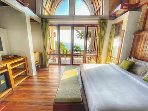 Signature Quadruple Room, Partial Sea View | In-room safe, blackout drapes, free WiFi