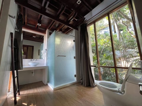 Signature Quadruple Room, Partial Sea View | In-room safe, blackout drapes, free WiFi