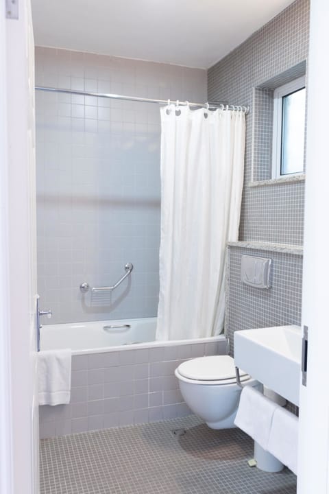 Standard Single Room, 1 Twin Bed | Bathroom | Shower, free toiletries, hair dryer, towels