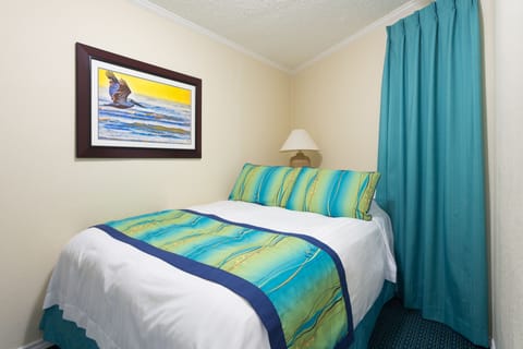 Suite, Kitchenette, Partial Ocean View | Blackout drapes, iron/ironing board, free cribs/infant beds, free WiFi