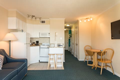 Suite, Kitchenette, Partial Ocean View | Private kitchen | Full-size fridge, microwave, oven, stovetop