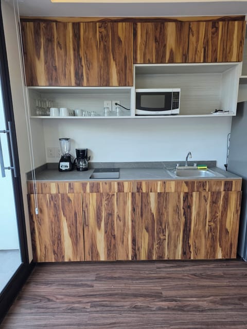 Comfort Apartment, 3 Bedrooms, Balcony | Private kitchen | Full-size fridge, microwave, stovetop, cookware/dishes/utensils