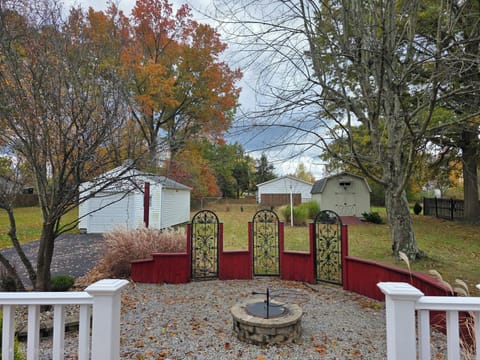 Outdoor patio with a fire pit. 