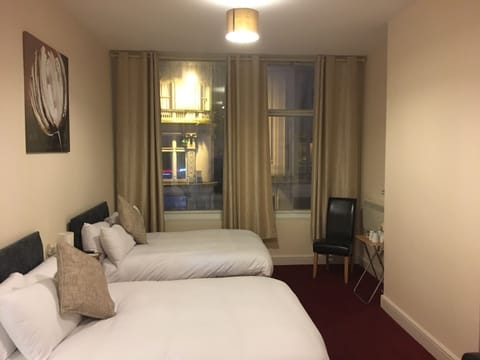 Comfort Quadruple Room, 1 Bedroom | Desk, iron/ironing board, free WiFi, bed sheets