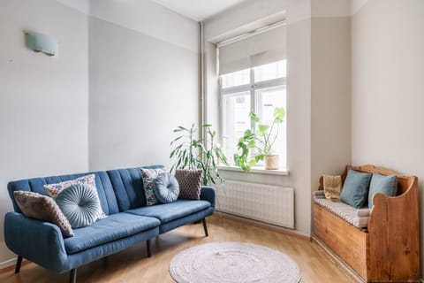 This bright corner is the perfect place to unwind after a day of exploring. Natural light, soft textures, and a calming, muted color palette make this space a true retreat.