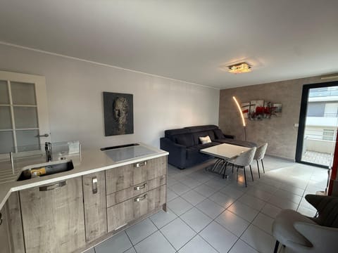 Living area and open plan kitchen