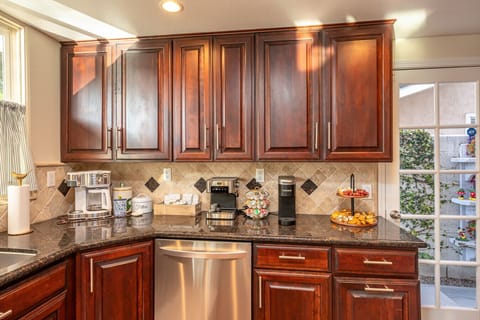 A dedicated coffee setup with drip, Keurig, a grinder, and a generous selection of coffee options to start your mornings right.