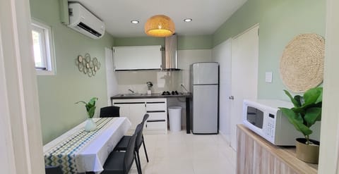 Deluxe Studio, Pool View | Private kitchen | Full-size fridge, microwave, stovetop, coffee/tea maker