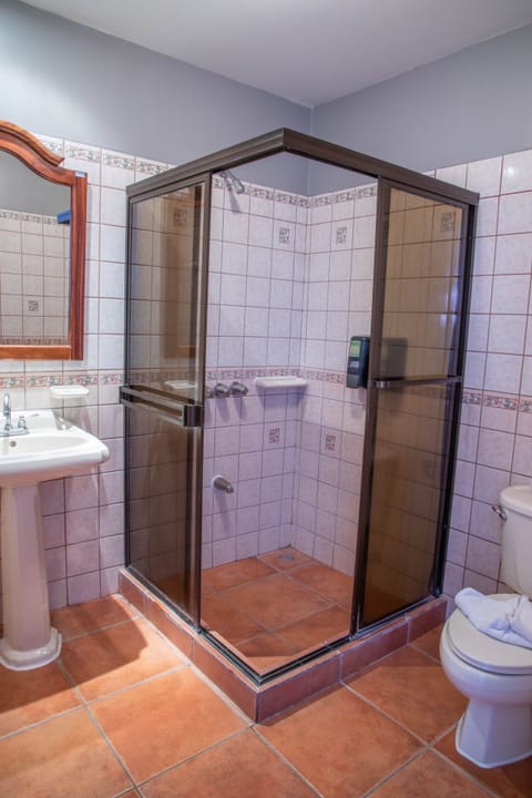 Deluxe Double Room, 2 Queen Beds, Partial Ocean View, Poolside | Bathroom | Shower, free toiletries, towels