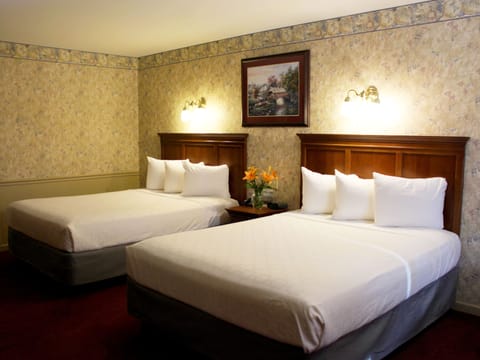 Standard Room, 2 Queen Beds, Jetted Tub | Soundproofing, iron/ironing board, rollaway beds, free WiFi