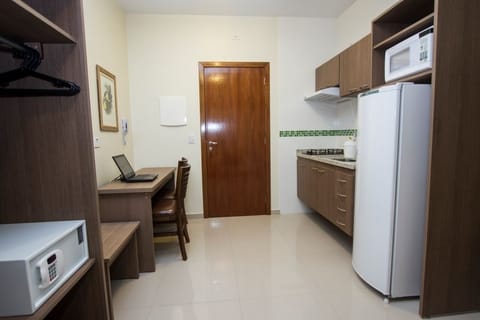 Standard Room, Multiple Beds | Living area | 24-inch LCD TV with cable channels, TV