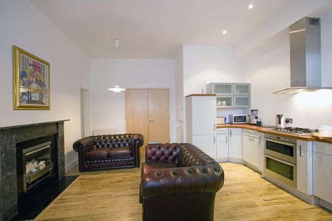 Standard Apartment, 3 Bedrooms (18 Golden Square) | Living area | Flat-screen TV, DVD player