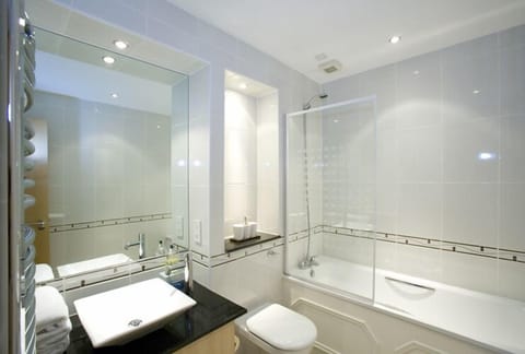 Standard Apartment, 3 Bedrooms (18 Golden Square) | Bathroom | Combined shower/tub, hair dryer, towels