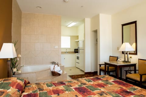 Deluxe Suite, 1 King Bed | 1 bedroom, desk, free WiFi, wheelchair access