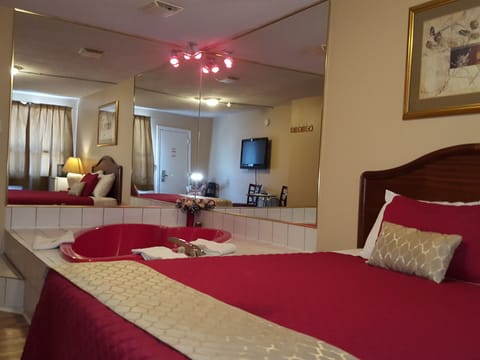 Deluxe Room, Jetted Tub | Iron/ironing board, free WiFi, bed sheets