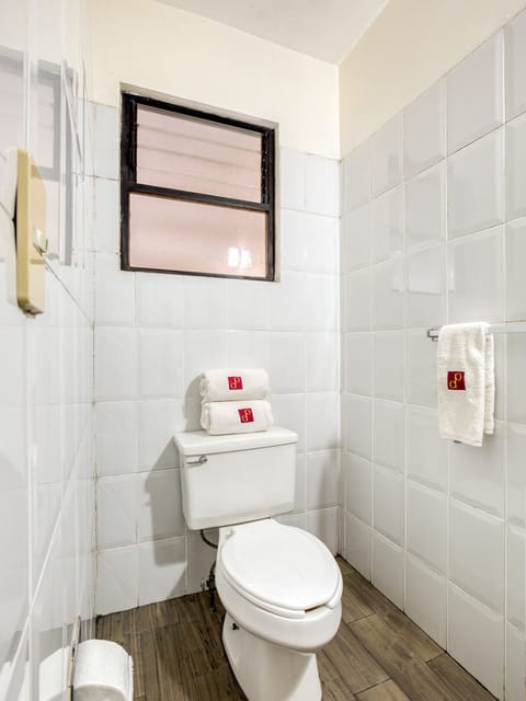 Standard Two Beds | Bathroom | Shower, hair dryer, towels, soap