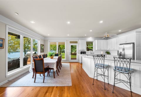 An open floor plan connects dining, kitchen, and views — perfect for entertaining and relaxing.