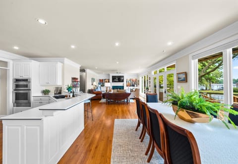 Bask in natural light as you move through this expansive, open-concept kitchen and dining space.